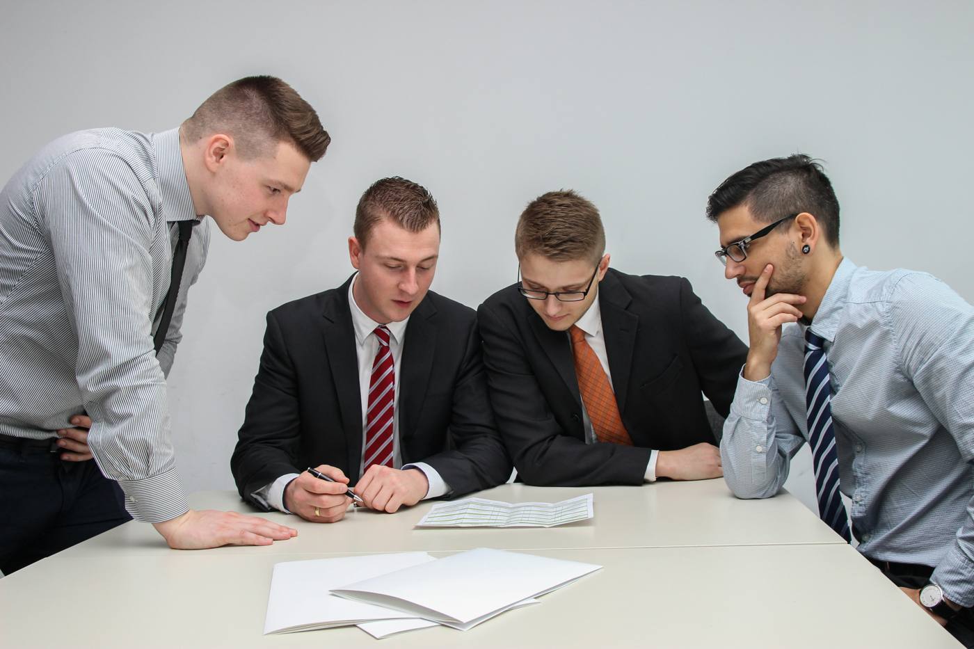 Team reviewing payroll paperwork together